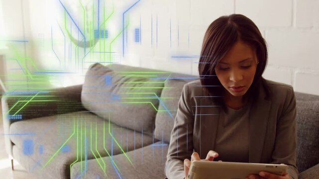 Woman tapping tablet and swiping, causing blue circuitry and green code flowing, visualizing data
