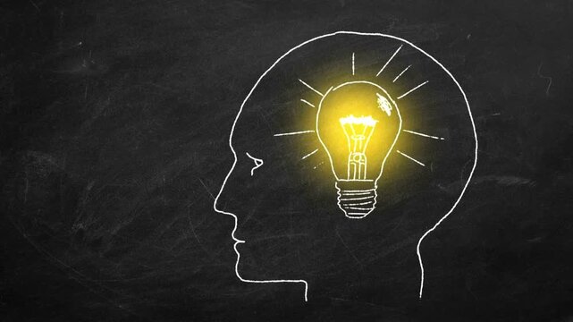 glowing brain idea head silhouette animation - Animated human head silhouette with glowing light bulb inside, representing thinking, intelligence, and idea generation.