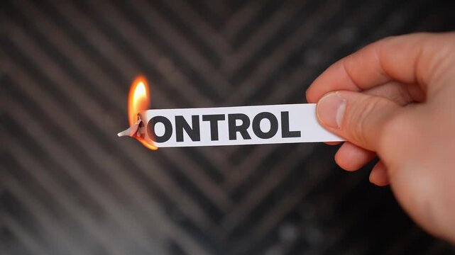 Burning &ldquo;CONTROL&rdquo; concept symbolizing freedom, autonomy, independence, and release from manipulation, restriction, micromanagement, and external pressure.