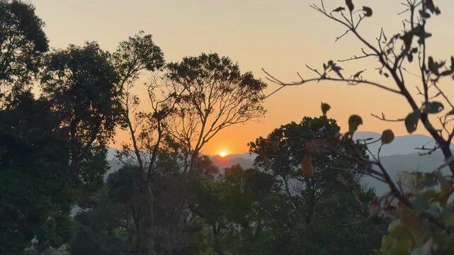 A golden sunrise unfolds over the Western Ghats of India as clouds drift and hills awaken in a stunning time-lapse of light, mist, and nature&rsquo;s timeless morning magic.