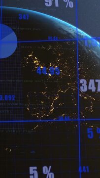 Illuminated globe rotating while camera panning downward, revealing tech analytics charts updating