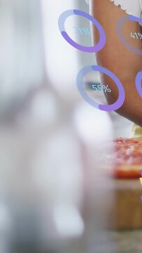 Vertical video: Couple making pizza partner entering rings and bars on arms rating cooking for food