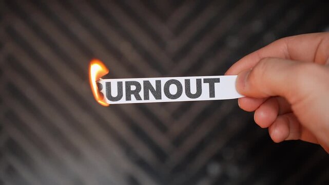 Burning &ldquo;BURNOUT&rdquo; concept symbolizing recovery, rest, emotional healing, energy renewal, and freedom from exhaustion, overload, fatigue, and chronic mental pressure.