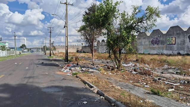 Street used for dumping trash by recyclable material collectors.
