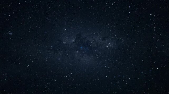 Star filled night sky with Milky Way band and faint nebula clouds evoking calm wonder in galaxy