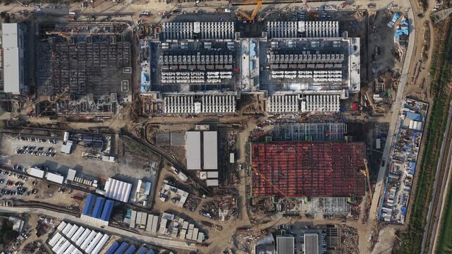 Top down aerial drone video of new hyperscale data center construction in Thailand, showing cloud infrastructure, AI expansion, industrial development, and digital economy growth.