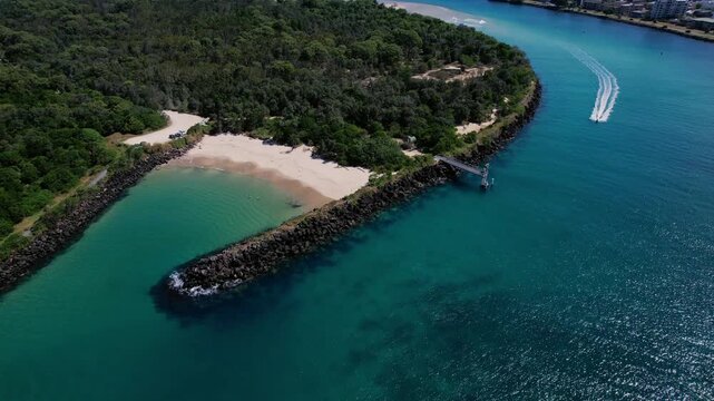 Motorboat At The Mouth Of The Tweed River In Tweed Heads, New South Wales, Australia. Aerial Drone Shot