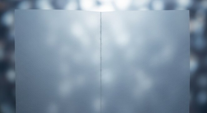 Delicately creased single sheet of translucent vellum material with subtle light patterns
