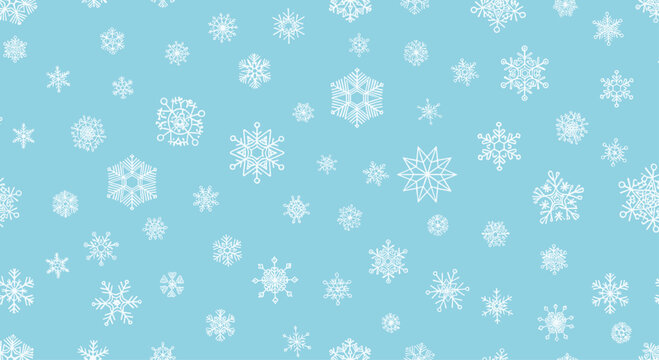Seamless winter pattern design featuring various white hand drawn snowflakes of different sizes and shapes on a light blue background for decor.
