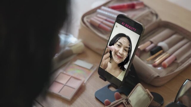 Asia people young gen z female happy smile enjoy phone apply selfie screen makeup blush virtual AI tech scan face app AR mixed augmented reality future beauty smart iot skin care help guide advice.