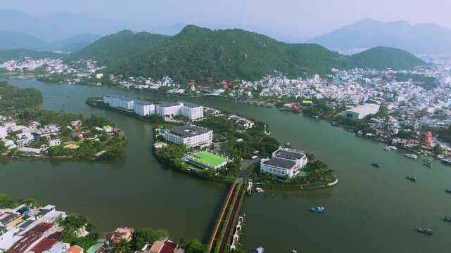 Aerial 4K view of winding Cai River with tropical coconut palms in Nha Trang near po nagar cham temple, Vietnam
the natural beauty of Central Vietnam&rsquo;s river systems
