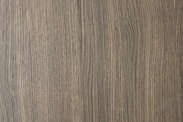 Fototapeta premium Natural brown wood texture background featuring vertical timber grain surface panel pattern offering warm calming feeling for rustic interior design backdrop and empty architectural detail