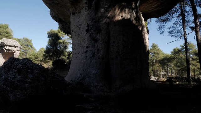 Ancient rock formations in serene forest, Cuenca, Spain, tranquil ambiance
