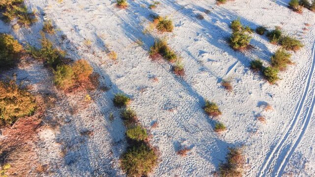 Exploring the white sand dunes in binh thuan vietnam with aerial views of nature and landscape.
