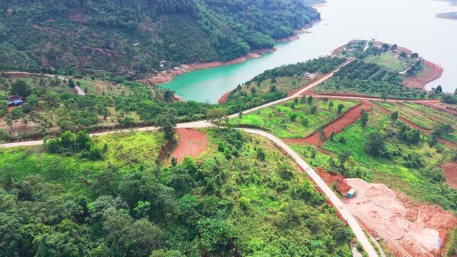 Exploring the green fields and crops in Loc Tan, Bao Lam, Lam Dong, Vietnam, in a rural landscape with natural growth.
