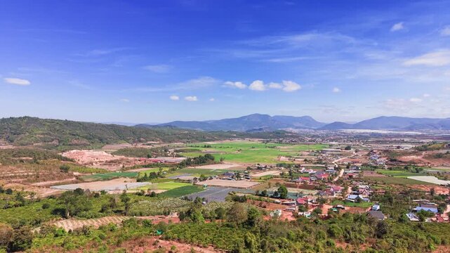 Exploring the Samten Hills area in dalat vietnam with views of fields and mountains.