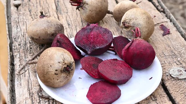 Fresh sliced beetroot on wooden surface. fresh beetroot on wooden background