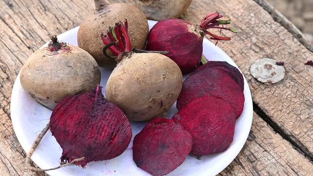 Fresh sliced beetroot on wooden surface. fresh beetroot on wooden background