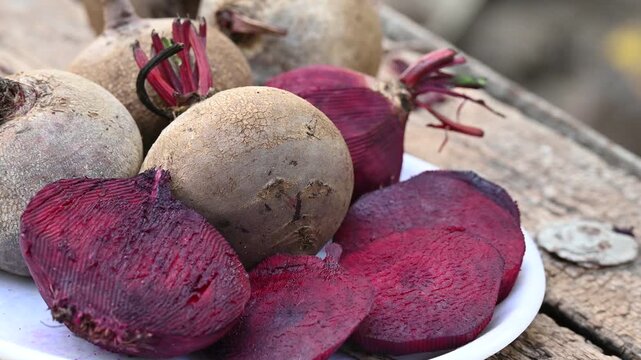 Fresh sliced beetroot on wooden surface. fresh beetroot on wooden background