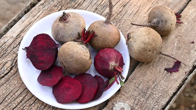 Fresh sliced beetroot on wooden surface. fresh beetroot on wooden background