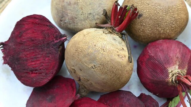 Fresh sliced beetroot on wooden surface. fresh beetroot on wooden background