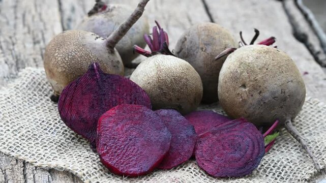 Fresh sliced beetroot on wooden surface. fresh beetroot on wooden background