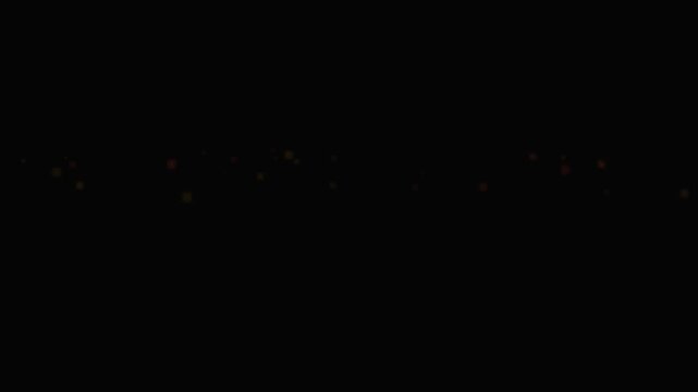 Red glowing particles floating in dark space motion