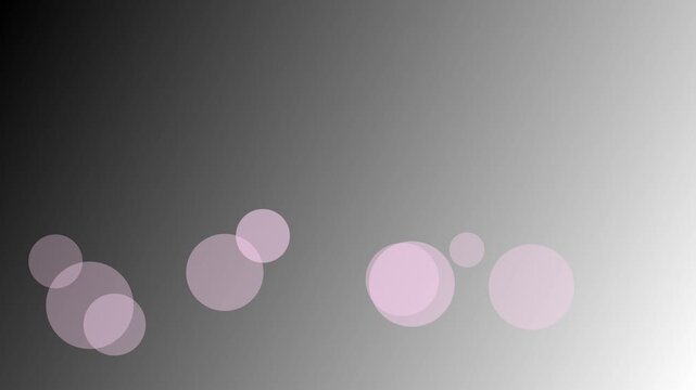 Soft pink bubbles floating in dark space motion