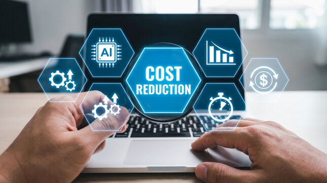 Businessman using laptop with digital interface showing cost reduction concept, business optimization and efficiency