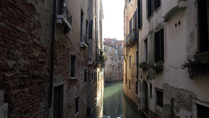 Venice, Italy. The Rio di Ca' Foscari is approximately 300 meters long. It opens onto the Grand Canal, Venice, Italy. It passes under the Ca' Foscari bridge. © Andreia