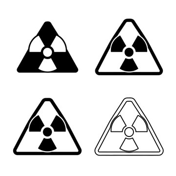 Four variations of the black and white radiation warning symbol