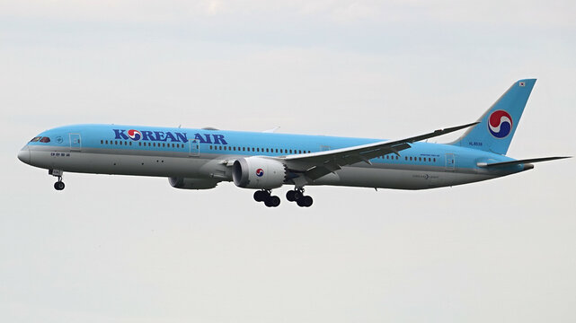 Boeing 787 Dreamliner Korean Airlines landing at Prague airport. Cloudy sky in the background.