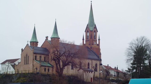 A view of the church in Krager&oslash;, Telemark, with its Neo-Gothic architecture, in southeastern Norway, on a cloudy day