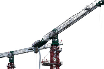 Construction crane with lattice boom towering against a partly cloudy sky highlighting intricate structure engineering detail and industrial strength in an urban setting © Jimmy
