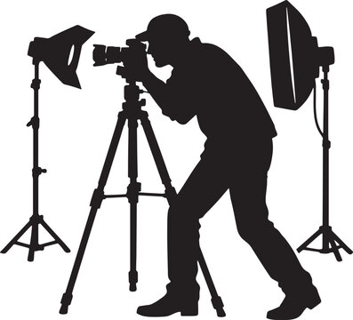 Silhouette of a photographer taking a picture with studio lighting