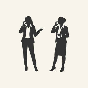 Silhouettes of two businesswomen talking on mobile phones, professional female colleagues standing and communicating in a business setting.
