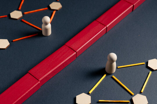 Divided network structure with barrier separating disconnected groups