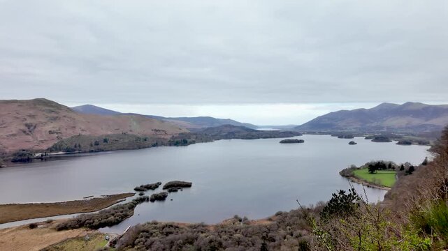 Derwentwater and Bassenthwaite lakes panorama from Surprise View showing the scenic Lake District landscape. pan left shot