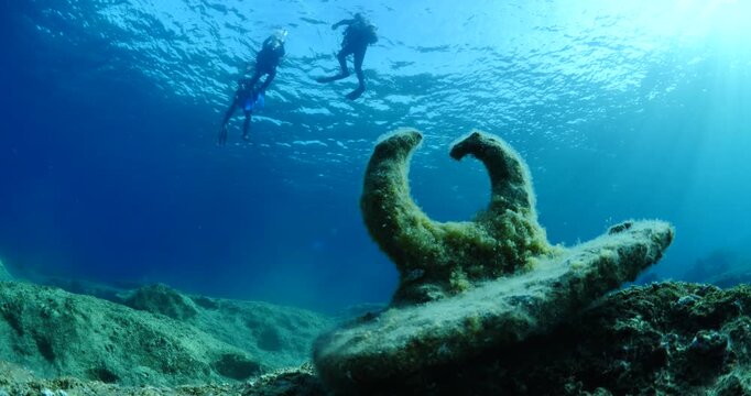amphora field underwater ancient antic amphoras scuba divers exploring and discovering deep water