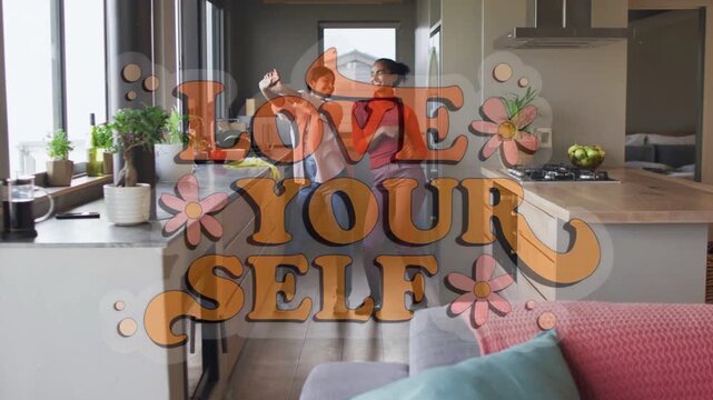 Mother and daughter raising arms and dancing down hallway, LOVE YOUR SELF overlay guiding wellness