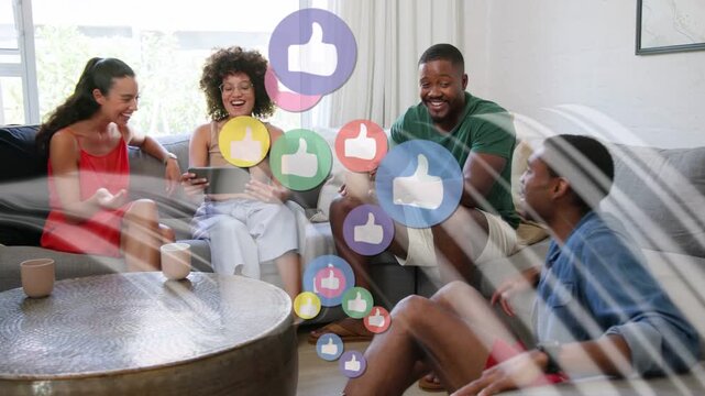 Four friends sharing tablet social content, tapping and causing floating thumbs-up icons over group
