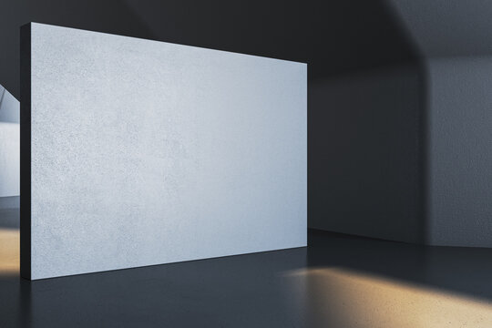 Blank modern interior wall with empty copyspace in contemporary gallery setting illuminated by soft light for mockup display. 3D Rendering