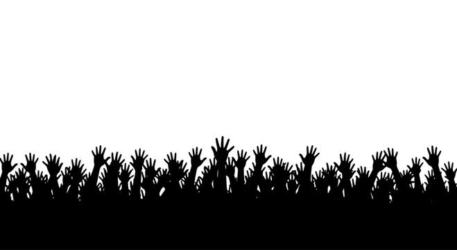 Many people raising hands in unison.