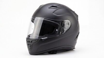 Fototapeta premium Matte black full face motorcycle helmet with a transparent protective visor for road safety gear