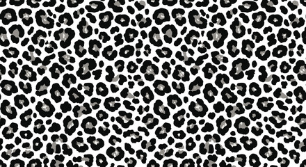 A seamless pattern of black leopard spots on a white background. © Nayan