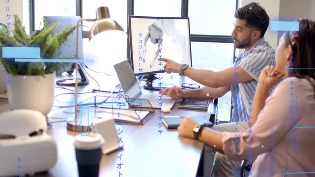 Indian man and diverse woman reviewing robot on monitor with blue overlays using laptop, copy space