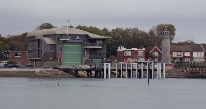 Wide shot of the RNLI Lifeboat station and the old lighthouse at Kingston Beach, Shoreham