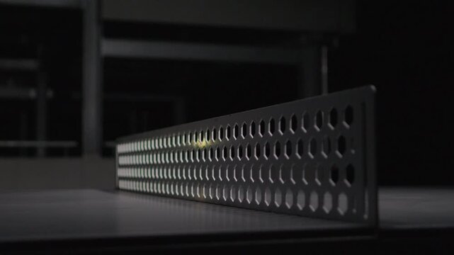 Slow motion of a table tennis game with ball flying back and forth