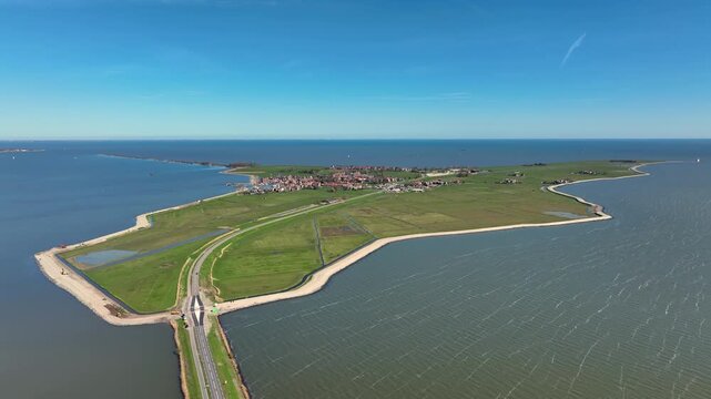 Overview of an island with a historic village in Europe