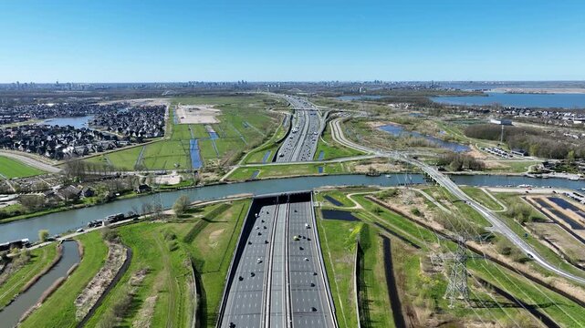 View of a road aqueduct above a busy highway in Europe